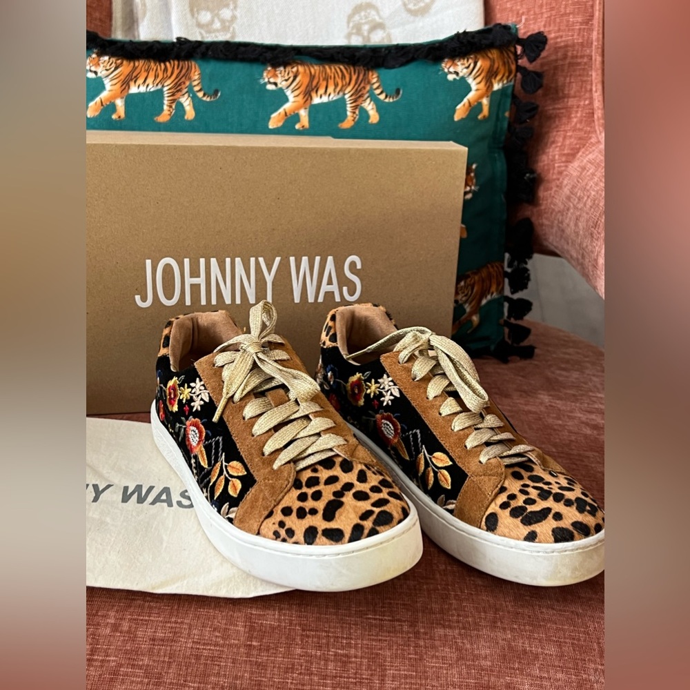 Johnny was leopard and floral sneakers